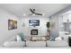 Cozy living room with a brick fireplace, comfortable seating, and stylish decor at 2818 N Yucca St, Chandler, AZ 85224