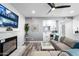 Inviting living room with a wet bar, fireplace, comfortable seating, and stylish decor at 2818 N Yucca St, Chandler, AZ 85224