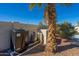 Pool equipment featuring a Hayward brand heater/filter and surrounded by a block wall, palm tree, and gravel at 2818 N Yucca St, Chandler, AZ 85224