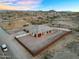 Expansive desert home features an attached garage, covered patio, and desert landscaping at 28204 N Royce Rd, Queen Creek, AZ 85144