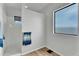 Contemporary bathroom showcasing a tiled shower, neutral walls and bright natural light at 28204 N Royce Rd, Queen Creek, AZ 85144