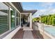 Covered patio overlooking a refreshing pool and well-maintained yard, ideal for outdoor relaxation at 2900 E Spring Wheat Ln, Gilbert, AZ 85296