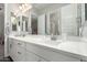 Bathroom featuring a double vanity with modern fixtures and ample counter space at 2900 E Spring Wheat Ln, Gilbert, AZ 85296