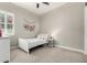 Charming bedroom features a twin bed, string lights, and ample space at 2900 E Spring Wheat Ln, Gilbert, AZ 85296
