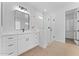 Bright bathroom featuring glass walk-in shower and double sink vanity with modern fixtures and plenty of counter space at 3557 S Halsted Ct, Chandler, AZ 85286