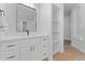 Bathroom features sleek vanity, modern fixtures, open shelving, and tile flooring at 3557 S Halsted Ct, Chandler, AZ 85286