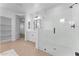 Bright bathroom with a glass shower and a white vanity with dark hardware at 3557 S Halsted Ct, Chandler, AZ 85286