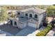 Stunning two-story home boasting a three-car garage, elegant design, and well-maintained landscaping at 3557 S Halsted Ct, Chandler, AZ 85286