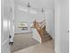 Spacious open concept foyer featuring staircase, soaring ceilings, large windows and neutral carpet at 3557 S Halsted Ct, Chandler, AZ 85286