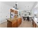 Kitchen showcasing a large island, stainless steel appliances, a dining area, and easy access to other living spaces at 3557 S Halsted Ct, Chandler, AZ 85286