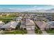 Expansive aerial view of the home in a Primary-planned community with mountain views, landscaped yards, and modern architecture at 3749 E Sagebrush St, Gilbert, AZ 85296