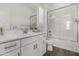 Clean bathroom showcasing a vanity with a large mirror and a shower with a glass door at 3749 E Sagebrush St, Gilbert, AZ 85296