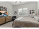 Comfortable bedroom featuring bright light, hardwood floors and a neutral color palette at 3749 E Sagebrush St, Gilbert, AZ 85296