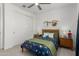 Comfortable bedroom featuring a double bed, playful decor, and a ceiling fan, creating a cozy and inviting atmosphere at 3749 E Sagebrush St, Gilbert, AZ 85296