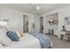 Bright bedroom with a ceiling fan, and a desk with drawers at 3749 E Sagebrush St, Gilbert, AZ 85296