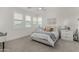 Bedroom featuring windows with plantation shutters and matching nightstands at 3749 E Sagebrush St, Gilbert, AZ 85296