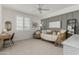 Bright bedroom featuring a decorative daybed and a writing desk at 3749 E Sagebrush St, Gilbert, AZ 85296