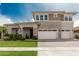 Beautiful two-story home featuring manicured lawn, stone accents, and double garage at 3749 E Sagebrush St, Gilbert, AZ 85296
