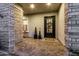 Inviting front porch with decorative brickwork, a stylish door, and charming accents at 3749 E Sagebrush St, Gilbert, AZ 85296