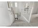 Bright staircase leading to the lower level, enhanced by natural light and complemented by stylish wall decor at 3749 E Sagebrush St, Gilbert, AZ 85296