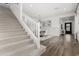 Carpeted staircase with white banister, offering a seamless transition between floors and ample natural light at 3749 E Sagebrush St, Gilbert, AZ 85296