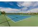 Brightly colored tennis courts offer a great recreational amenity in this community at 3749 E Sagebrush St, Gilbert, AZ 85296