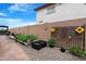 Backyard featuring garden beds and gravel at 40610 W Desert Fairways Dr, Maricopa, AZ 85138