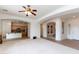 Open concept living space featuring a spacious layout and seamless flow to kitchen at 4313 N 161St Ave, Goodyear, AZ 85395