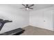 This bedroom has carpet, a ceiling fan, and a closet near the door at 4445 E Coconino St, Phoenix, AZ 85044