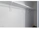 The closet has a shelf with a metal hanging rod for clothes storage at 4445 E Coconino St, Phoenix, AZ 85044