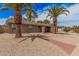 Front exterior view featuring desert landscaping and a brick walkway to the front door at 4445 E Coconino St, Phoenix, AZ 85044