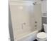 Bathroom features a shower-tub combo with white tile and modern fixtures, offering a clean and functional space at 461 W Holmes Ave # 374, Mesa, AZ 85210