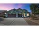 Charming single-story home features a three car garage and well manicured landscaping with desert rock at 5153 W Topeka Dr, Glendale, AZ 85308