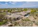 Aerial view of homes featuring desert landscaping, tile roofs, and backyard patios at 6214 E Evening Glow Dr, Scottsdale, AZ 85266