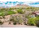 Beautiful desert backyard featuring desert landscape, a fence, and neighborhood views at 6214 E Evening Glow Dr, Scottsdale, AZ 85266