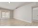 Bright living room featuring light wood floors, sliding glass door and neutral paint at 6335 E Brown Rd # 1098, Mesa, AZ 85205