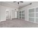 Spacious main bedroom showcasing a ceiling fan, walk-in closet and en-suite bathroom at 6335 E Brown Rd # 1098, Mesa, AZ 85205