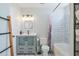 Stylish bathroom featuring modern vanity with sleek fixtures, a shower-tub combo, and white subway tiles at 6540 N 7Th Ave # 46, Phoenix, AZ 85013