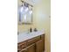 Stylish half bathroom with custom mirror and vanity, creating a modern and inviting space at 6540 N 7Th Ave # 46, Phoenix, AZ 85013