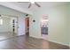 Spacious bedroom offering hardwood floors, a ceiling fan, and an ensuite bathroom at 6540 N 7Th Ave # 46, Phoenix, AZ 85013