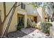Inviting condo exterior with a private patio, charming details, and cozy seating area at 6540 N 7Th Ave # 46, Phoenix, AZ 85013