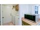 Bright laundry room with full-size washer and dryer, side counter, and direct access to the exterior at 6540 N 7Th Ave # 46, Phoenix, AZ 85013