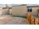 This cozy backyard features a secure fence, storage shed, and brick paved patio at 6711 W Osborn Rd # 68, Phoenix, AZ 85033