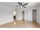 Spacious main bedroom features neutral walls, fan, and flooring, with an ensuite bathroom and closet at 6711 W Osborn Rd # 68, Phoenix, AZ 85033