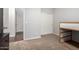 Cozy bedroom with neutral colors, carpet flooring, and a bunk bed, perfect for rest and relaxation at 6904 W Ashby Dr, Peoria, AZ 85383