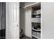 Efficient closet with organization system, perfect for storing shoes, clothes and essentials at 6904 W Ashby Dr, Peoria, AZ 85383