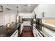 Bright kitchen with white cabinets, granite countertops, stainless steel appliances, and a central island at 6904 W Ashby Dr, Peoria, AZ 85383