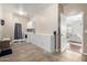 Functional laundry room with modern appliances, storage cabinets, and tiled flooring at 6904 W Ashby Dr, Peoria, AZ 85383