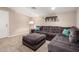 Cozy living room with comfortable seating offers a relaxing atmosphere for entertaining at 6904 W Ashby Dr, Peoria, AZ 85383