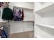 Spacious walk-in closet provides ample storage with shelving and hanging rods at 6904 W Ashby Dr, Peoria, AZ 85383